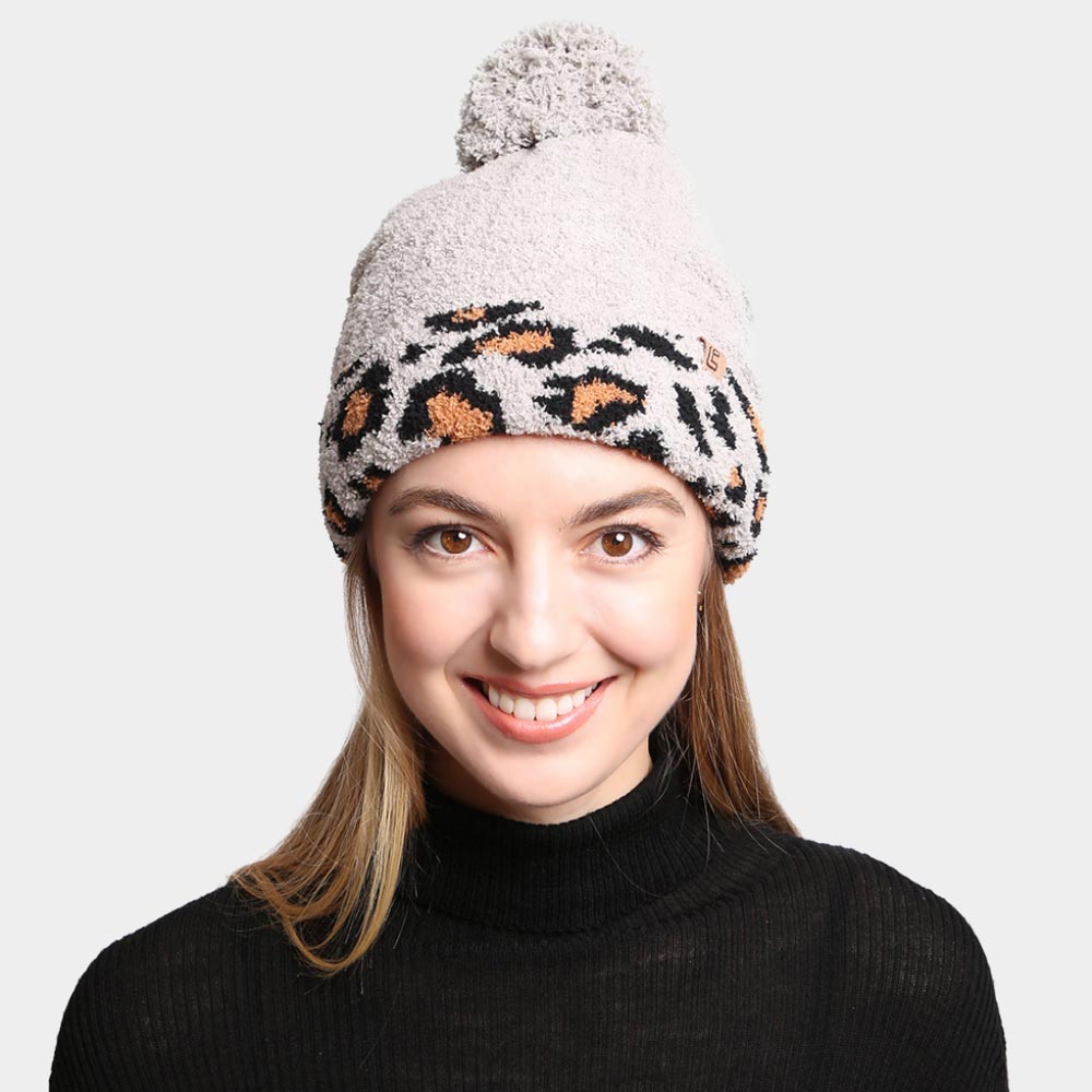 HATEGORY Solid Color Linked Leopard Accented Pom-Pom Beanie
